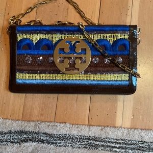 Tory Burch limited addition clutch chain strap.